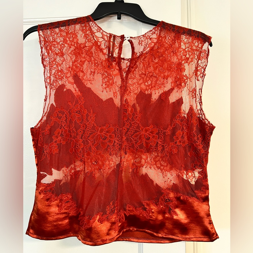 Anthropologie burnt orange Lace Top Size Large. Never worn